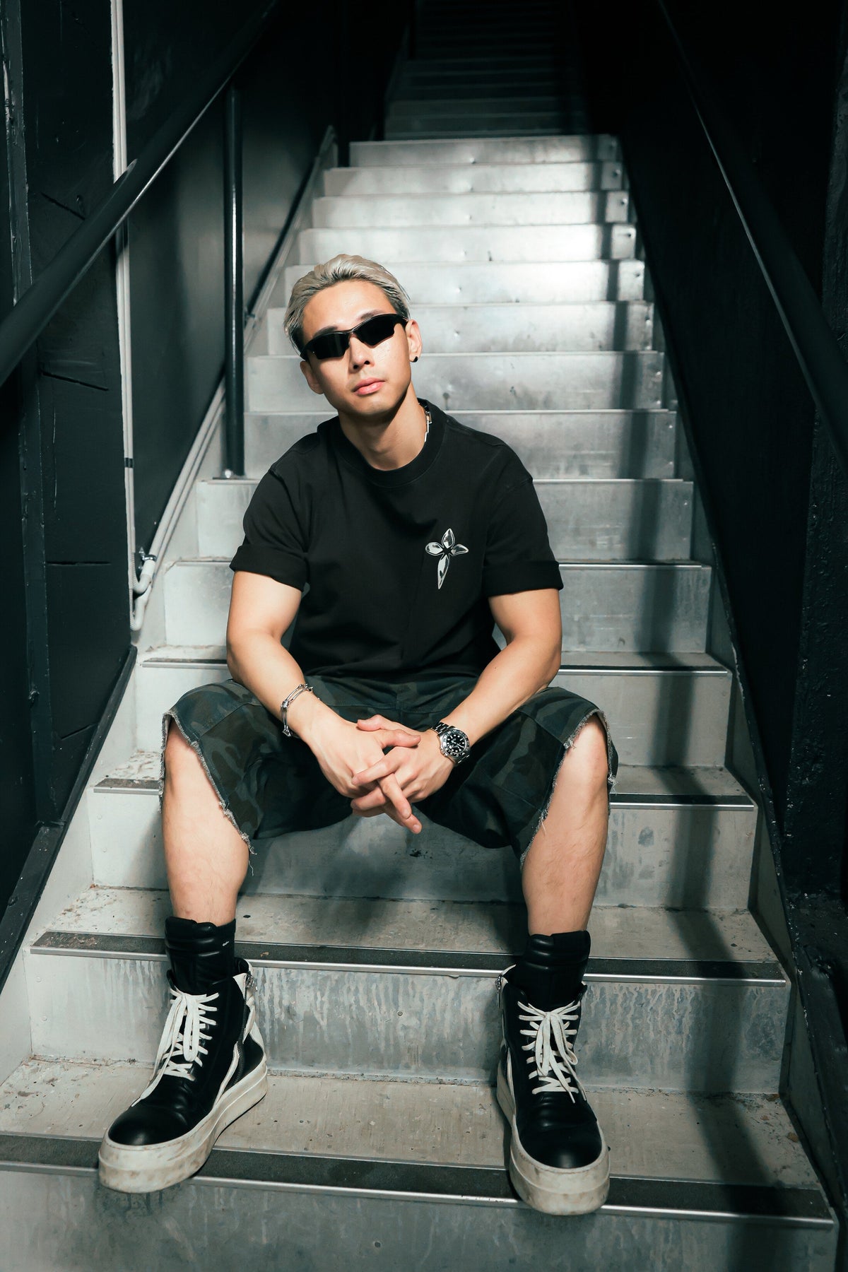 Metallic Cross Tee in a stairwell