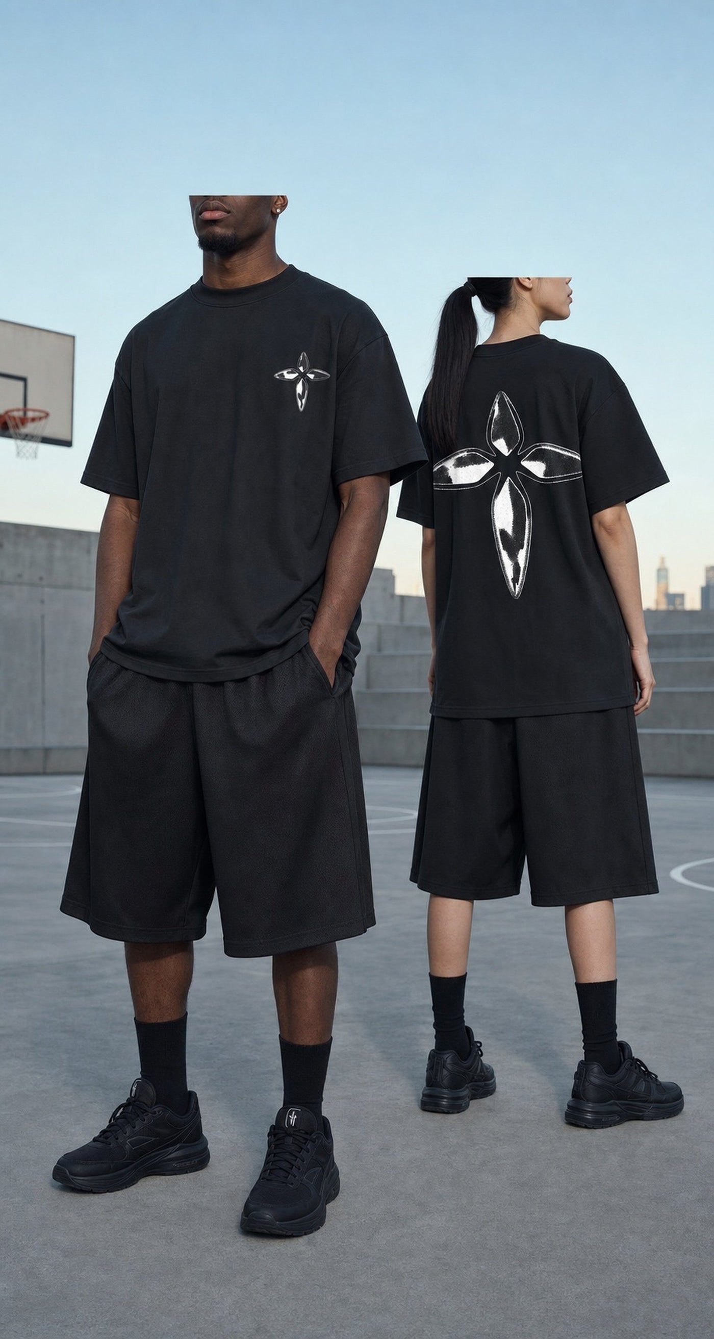 Metallic Cross Tee worn on a rooftop court in daylight — chest cross and full back cross