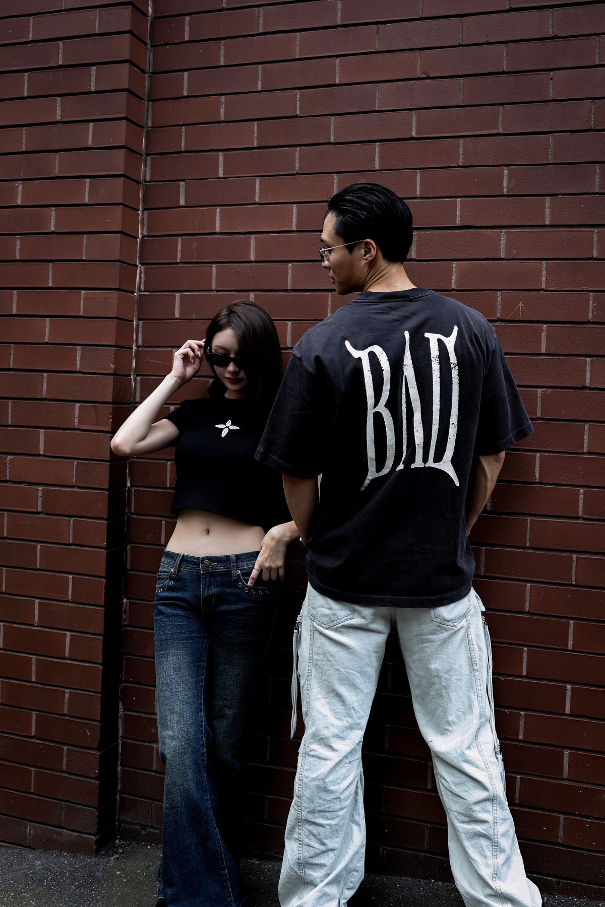 BAD Tee from behind — the arched BAD wordmark across the back
