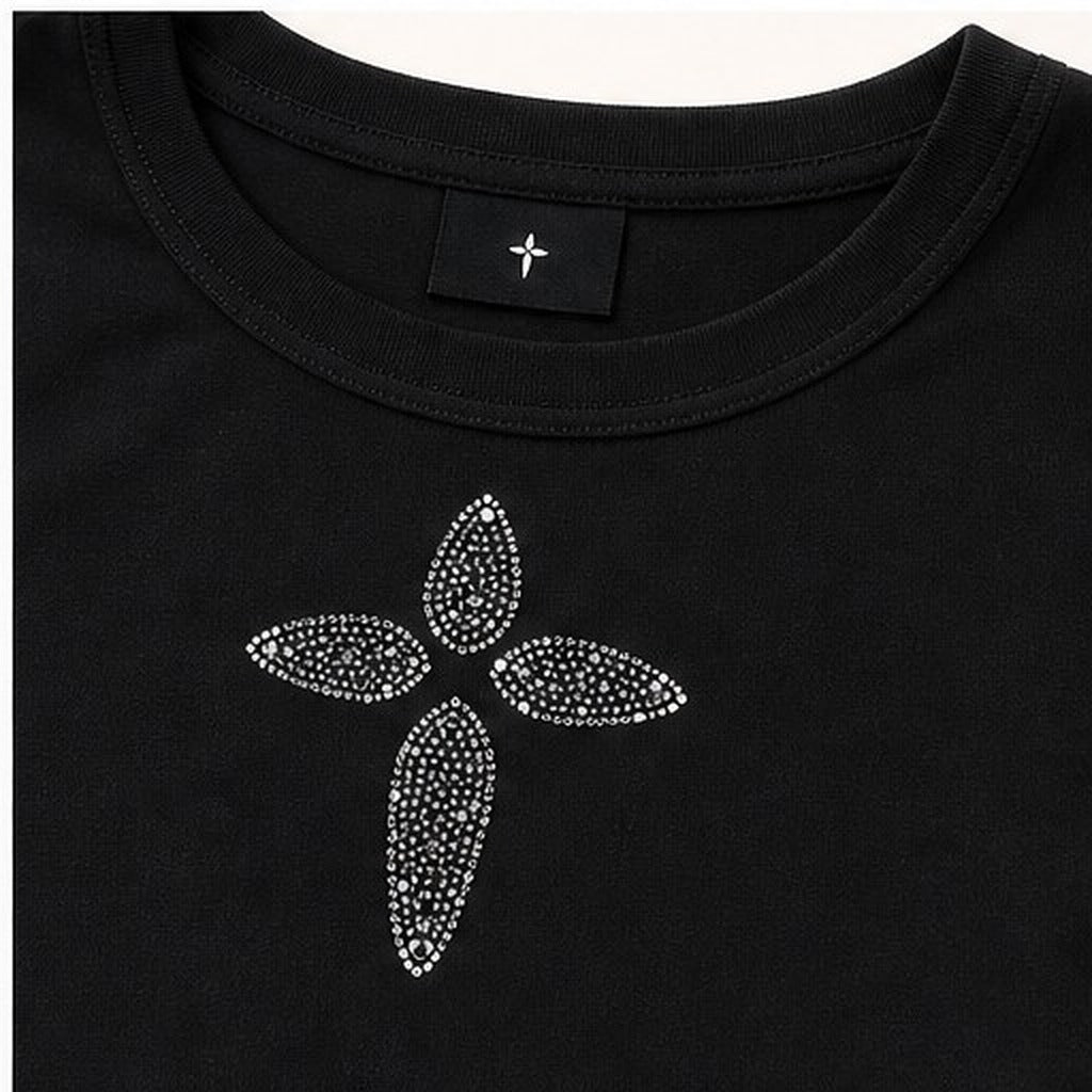 Close detail of the rhinestone cross