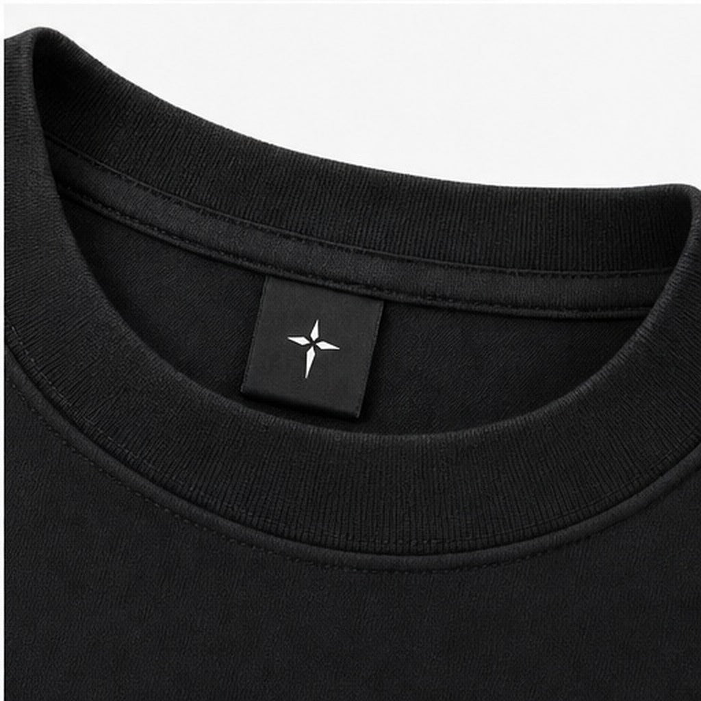 Black woven neck label with the white cross